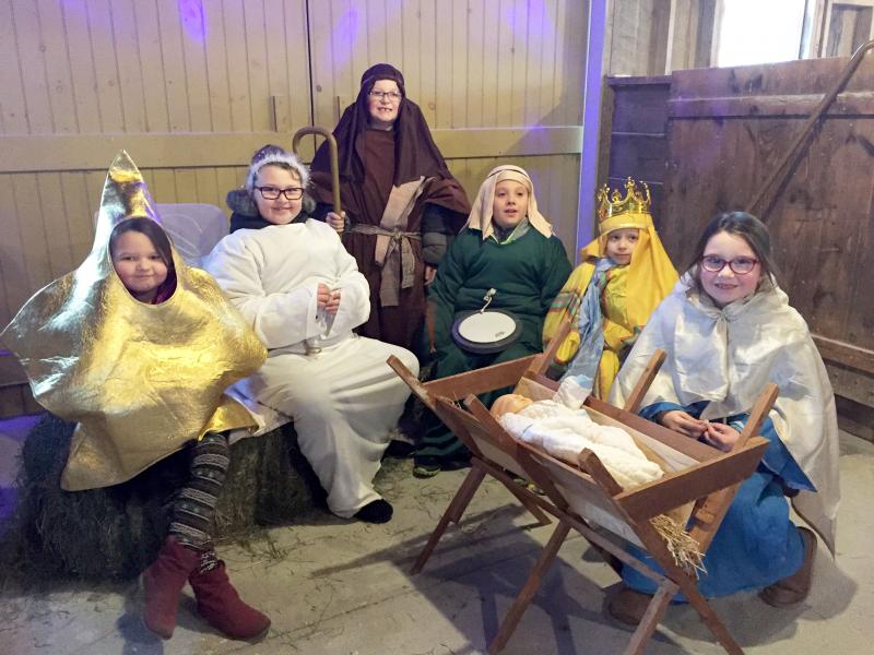 Lauren Kochan (5), Brooke Kochan (8), Alden Whitehead (9), Jayden Rios (8), Chase Thibeault (5), and Morgan Kochan (7) act out the first Christmas. BY ANGIE HILSMAN